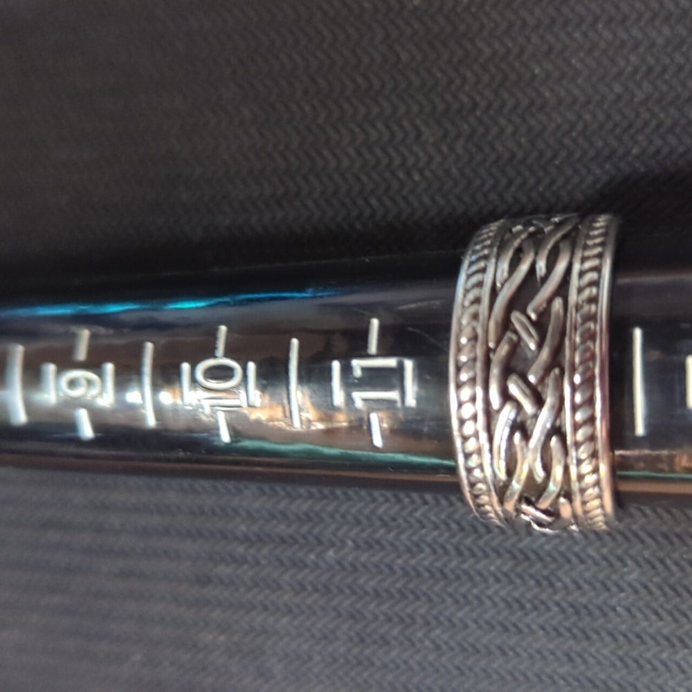 Preloved stainless steel Celtic silver band.